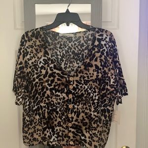 Top with print and buttons down the middle